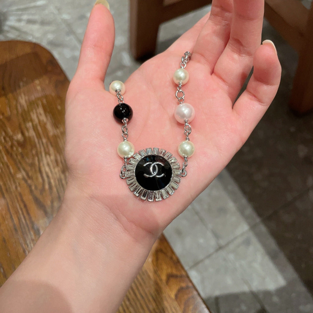 CHANEL P110 Pearl Double-C Necklace