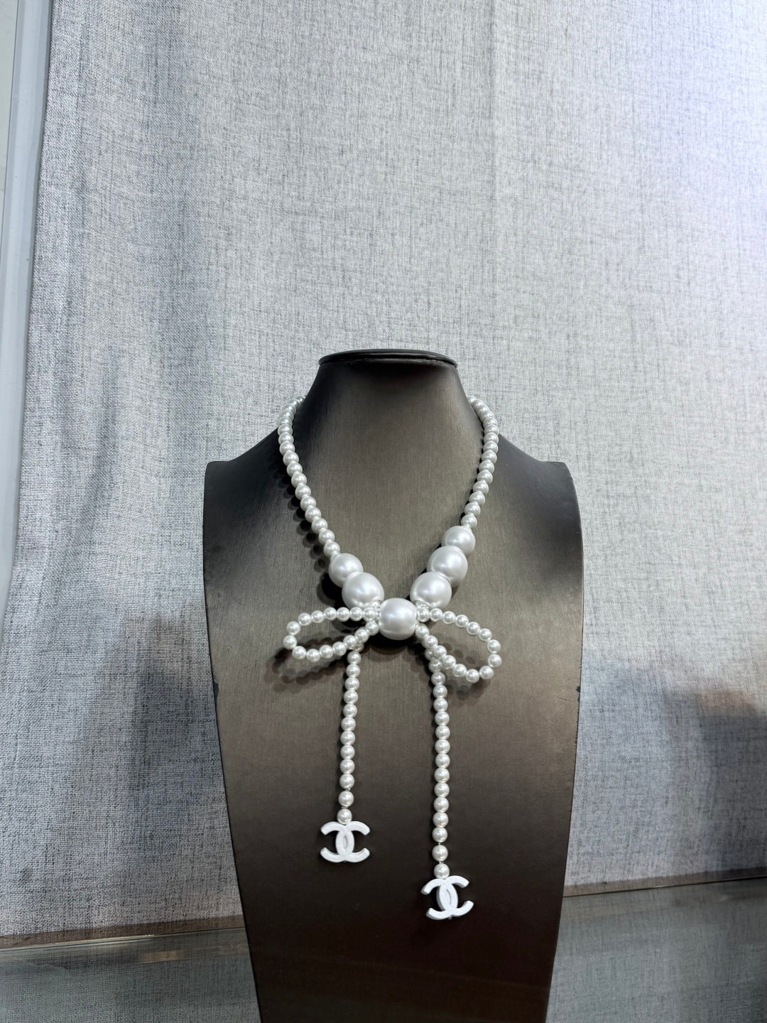 CHANEL Pearl Bow Necklace