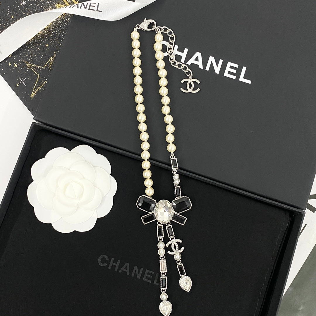 CHANEL Pearl Crystal Bow Necklace