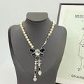 CHANEL Pearl Crystal Bow Necklace