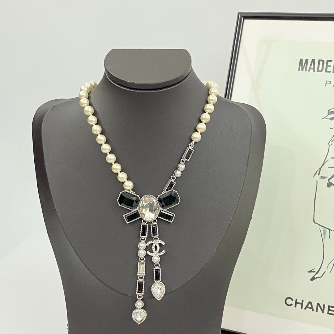 CHANEL Pearl Crystal Bow Necklace