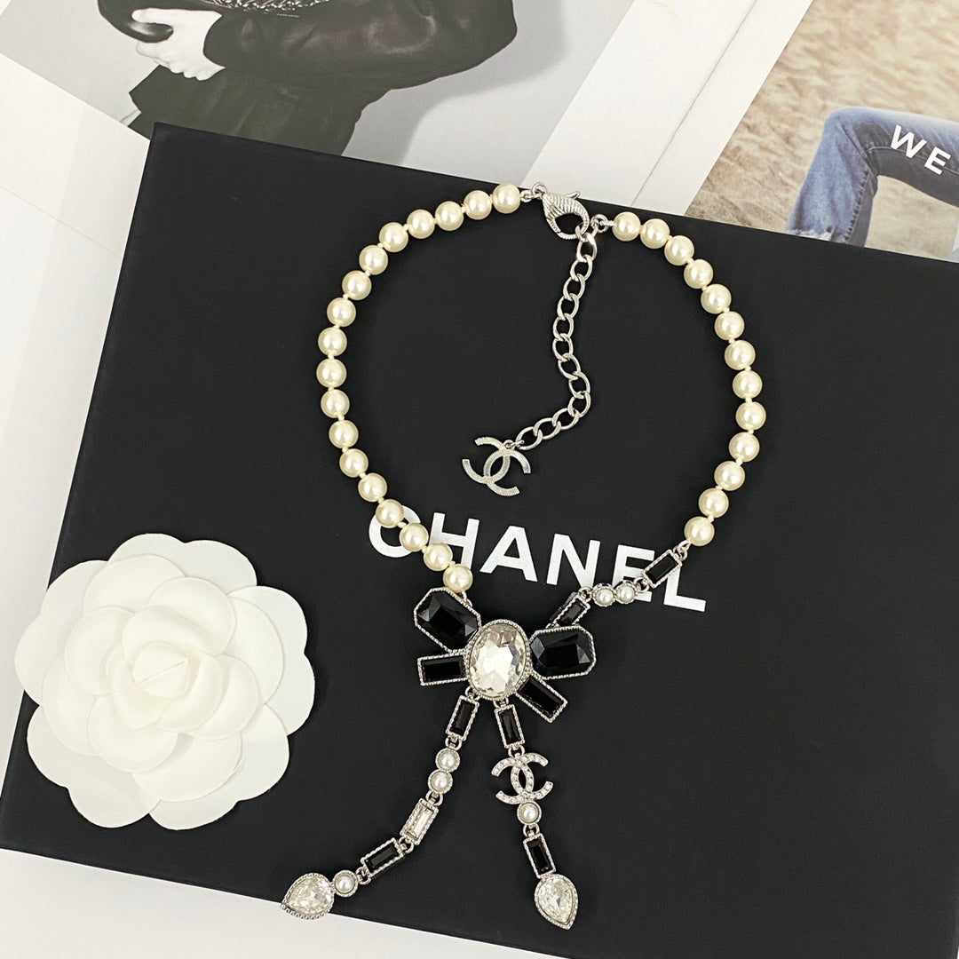 CHANEL Pearl Crystal Bow Necklace