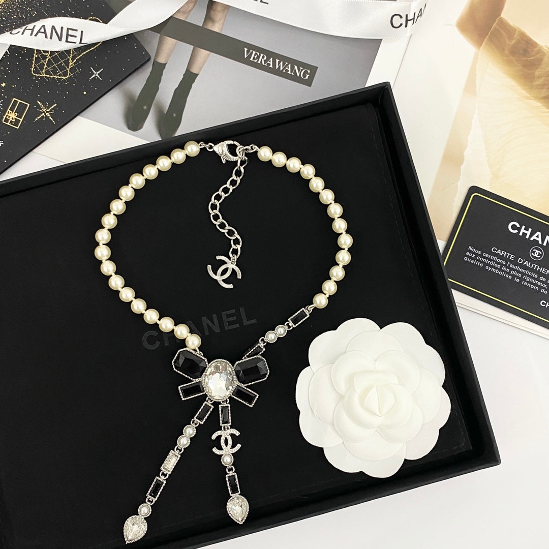 CHANEL Pearl Crystal Bow Necklace