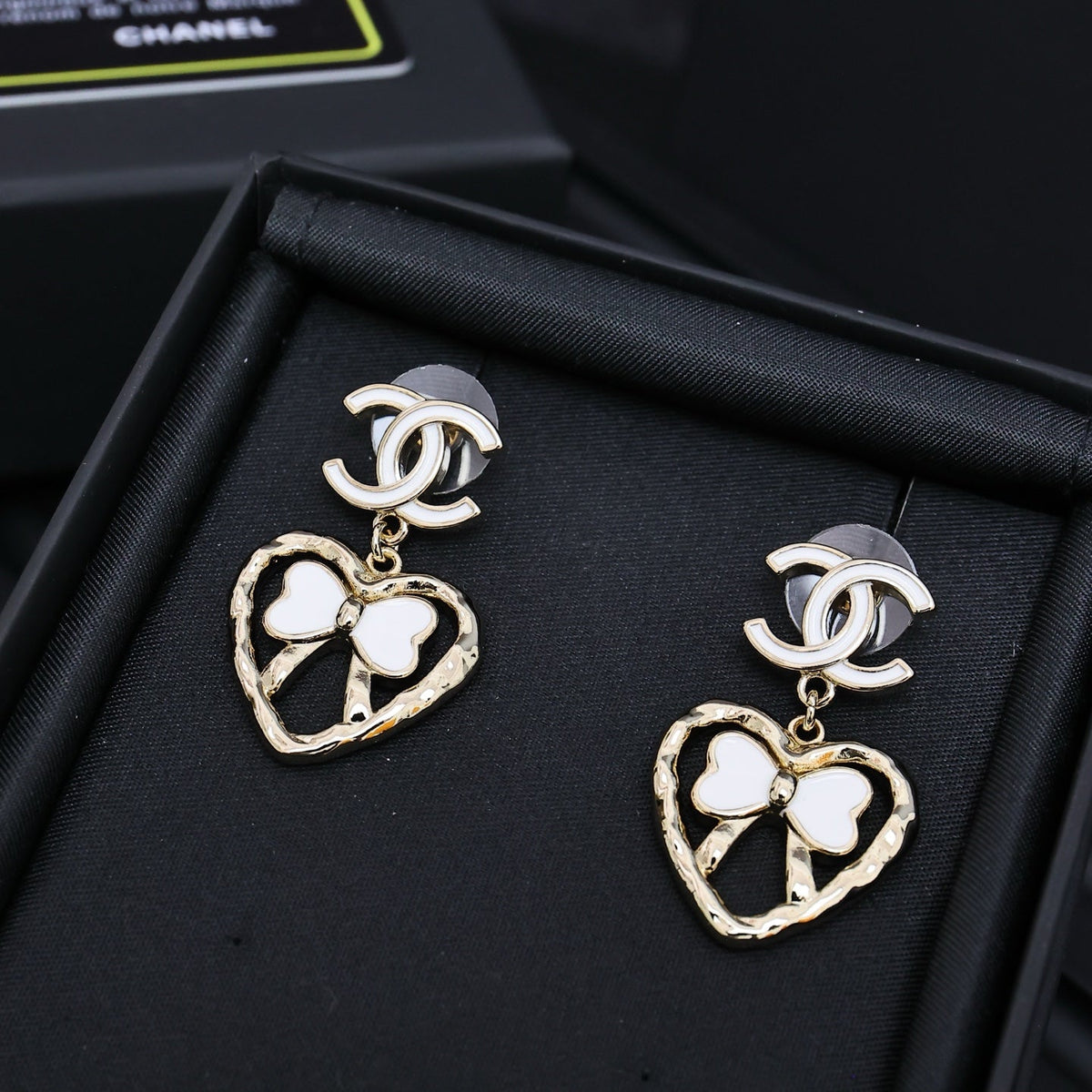 CHANEL Enamel Bow Earrings