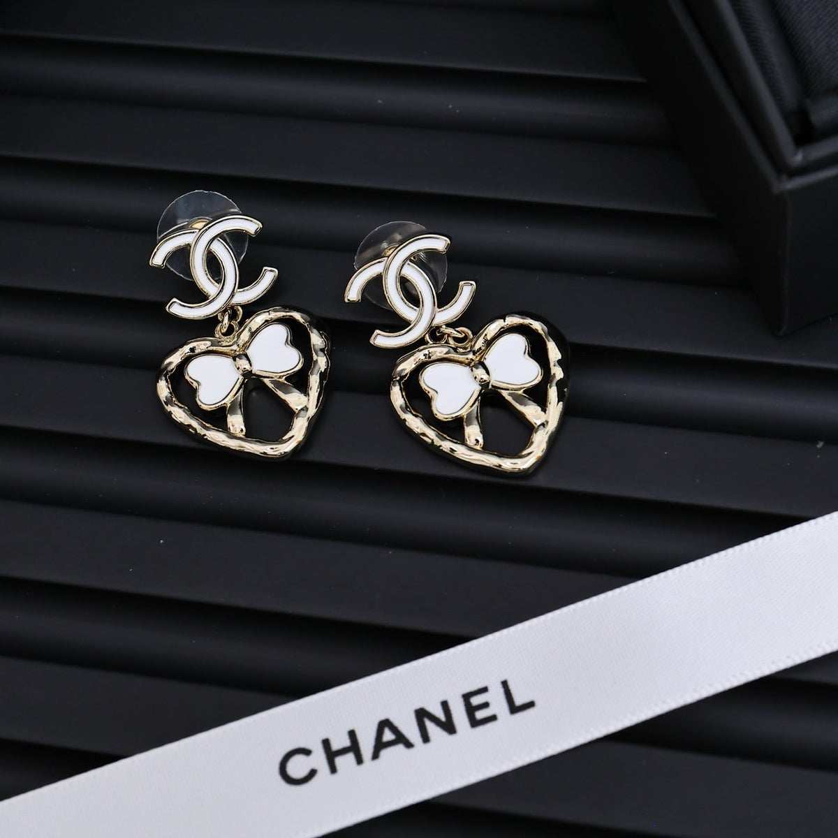 CHANEL Enamel Bow Earrings