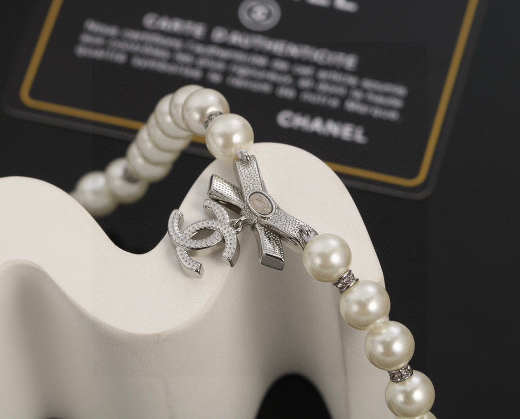 CHANEL Pearl Bow Choker Necklace
