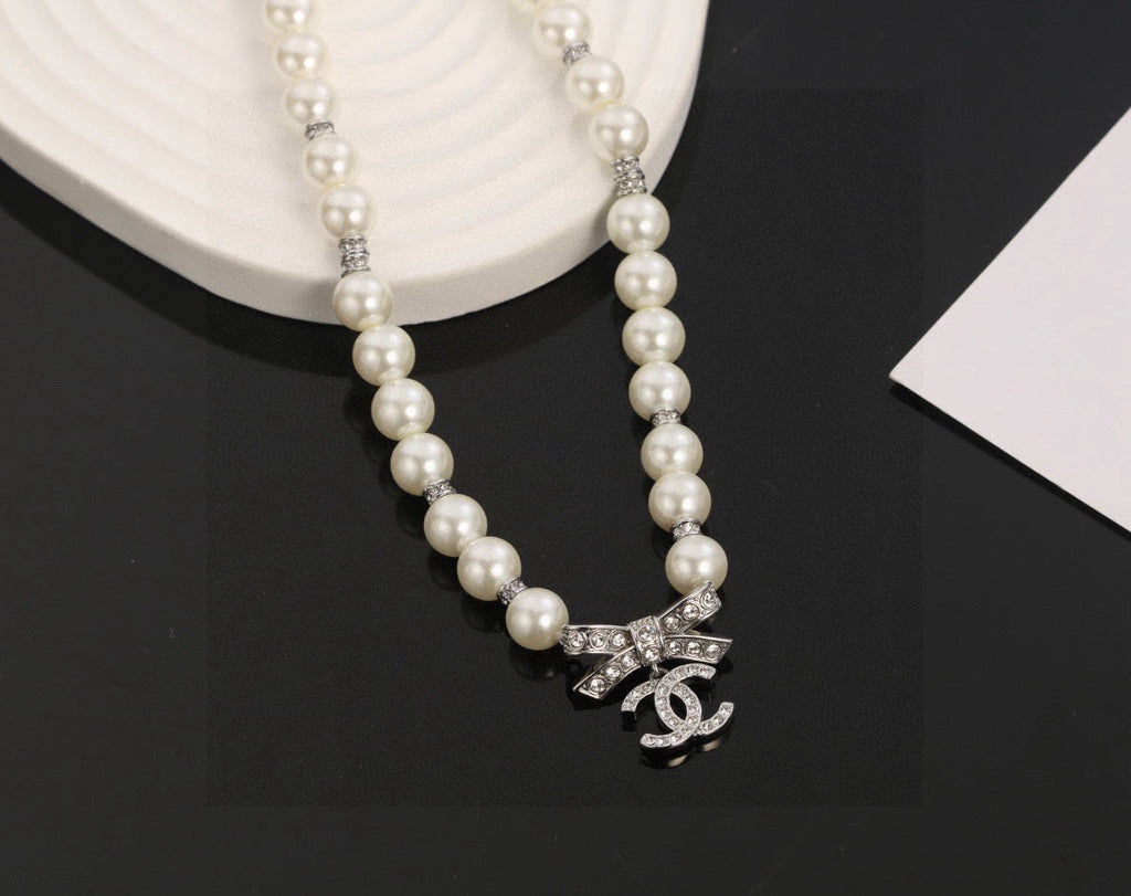 CHANEL Pearl Bow Choker Necklace