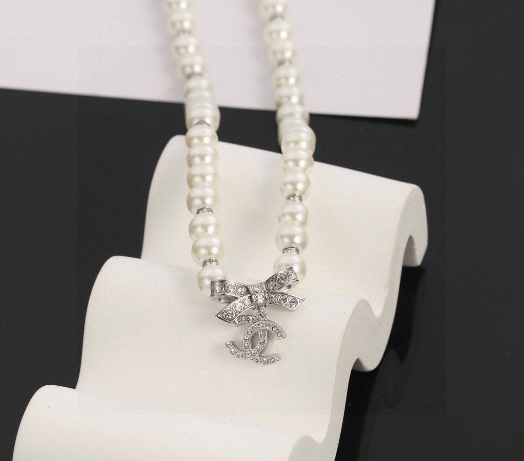 CHANEL Pearl Bow Choker Necklace