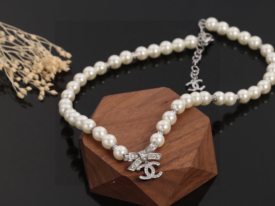 CHANEL Pearl Bow Choker Necklace