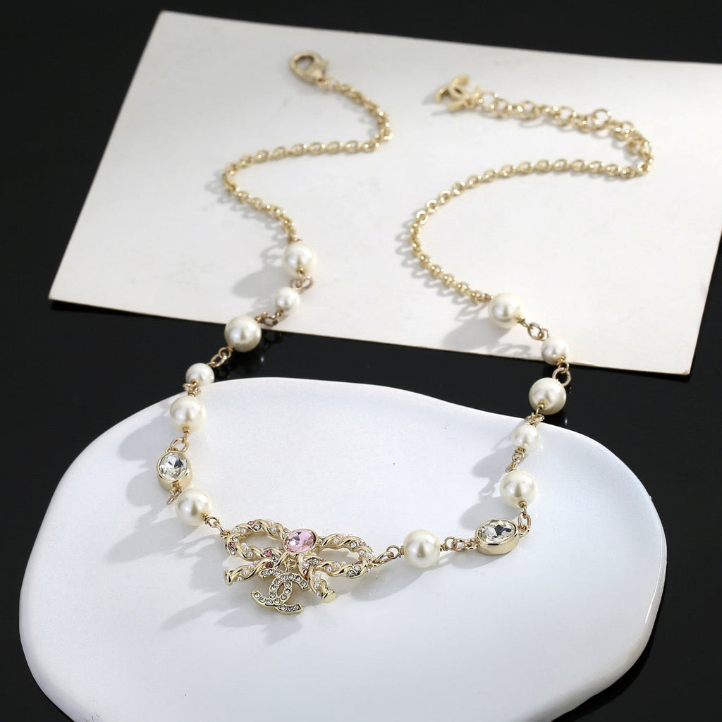 CHANEL Pearl Bow Long Necklace