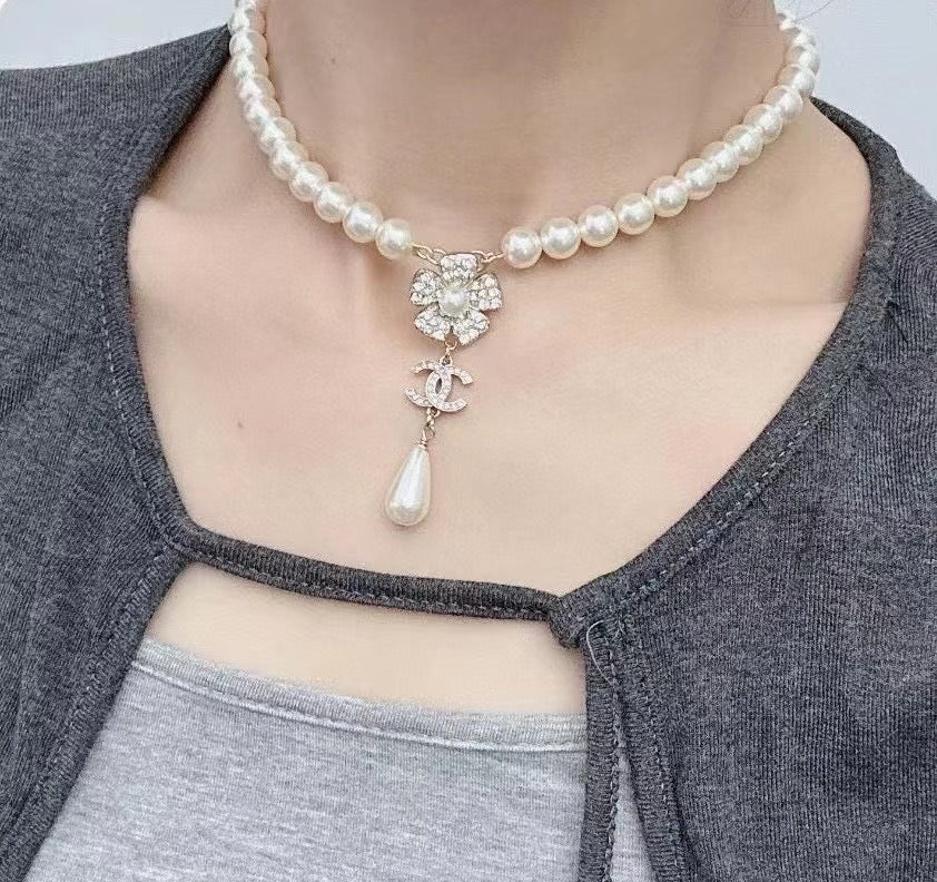 CHANEL Pearl Double-C Camellia Long Necklace