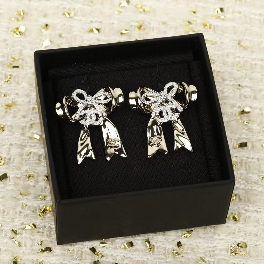 CHANEL Bow Earrings