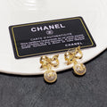 CHANEL Bow Earrings
