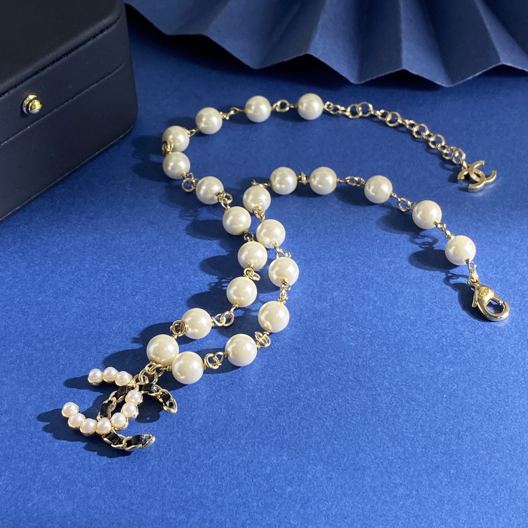 CHANEL P70 Pearl Double-C Long Necklace