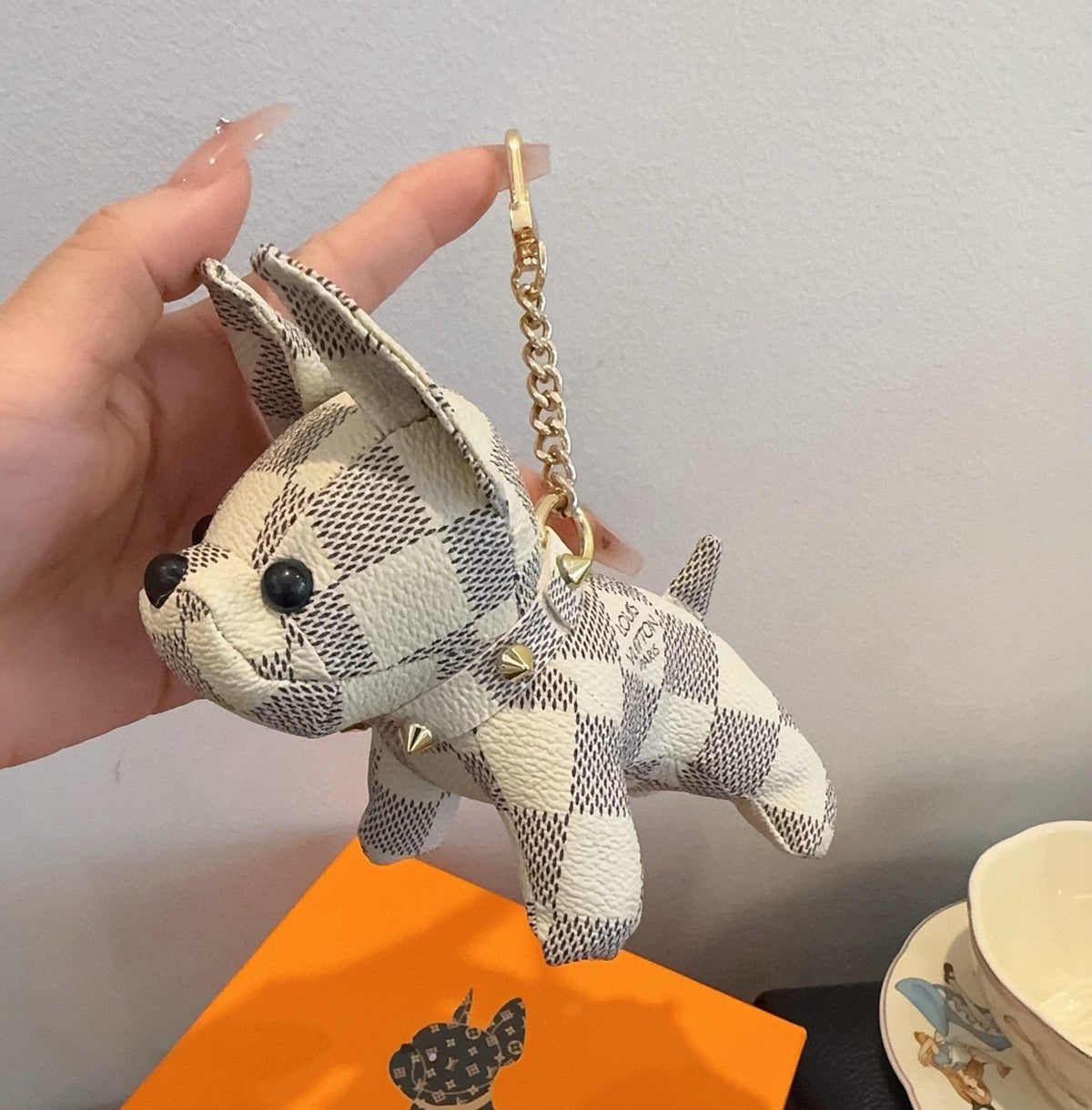 LOUIS VUITTON Metal Logo Keychain