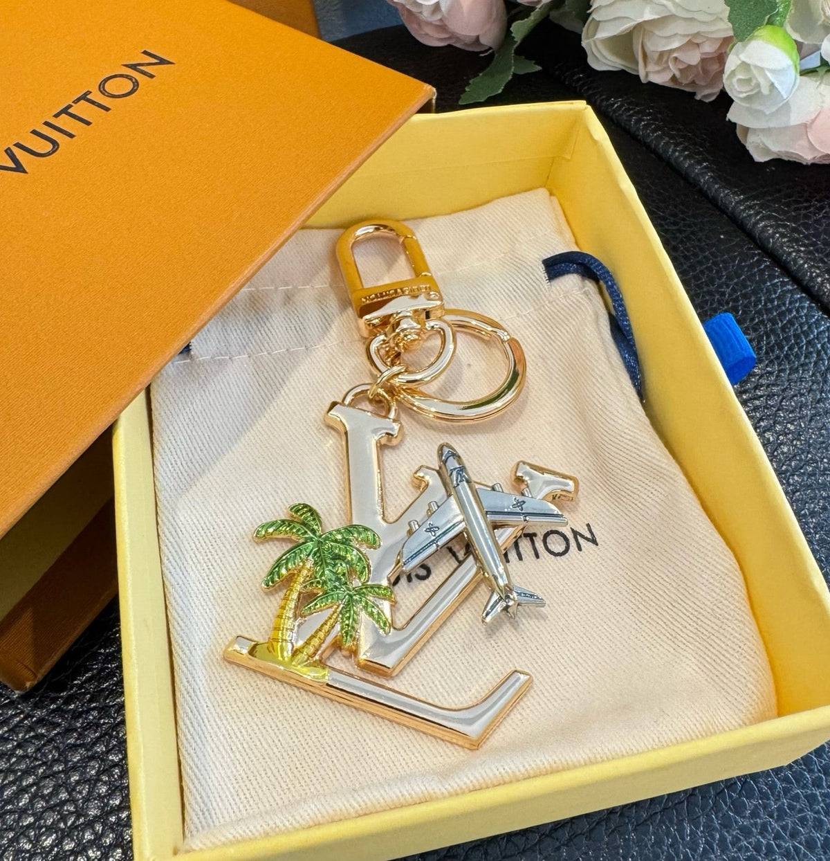 LOUIS VUITTON Metal Logo Bag Charm Keychain