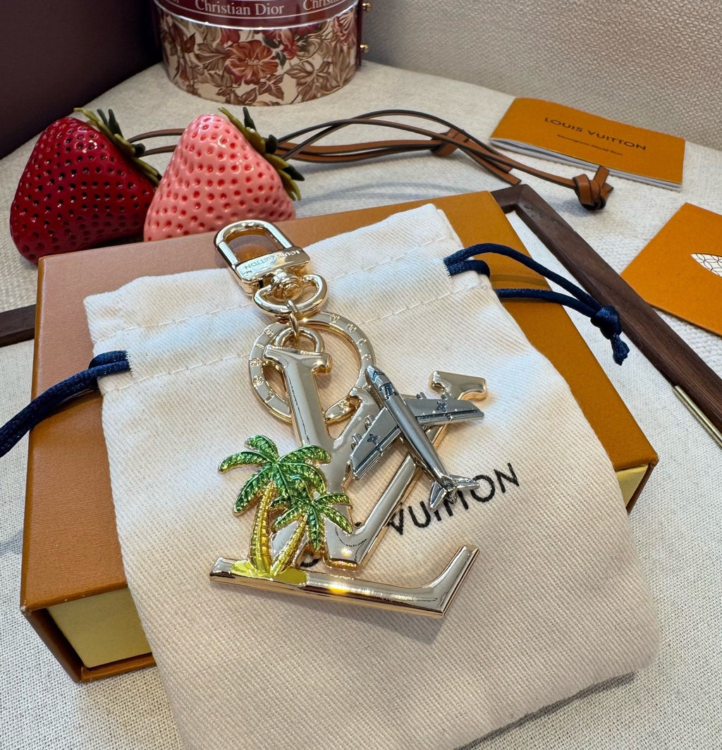 LOUIS VUITTON Metal Logo Bag Charm Keychain