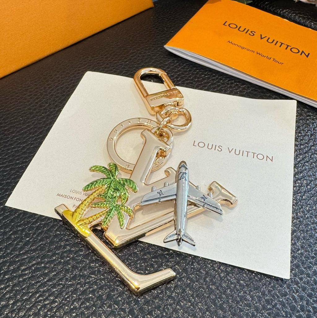 LOUIS VUITTON Metal Logo Bag Charm Keychain