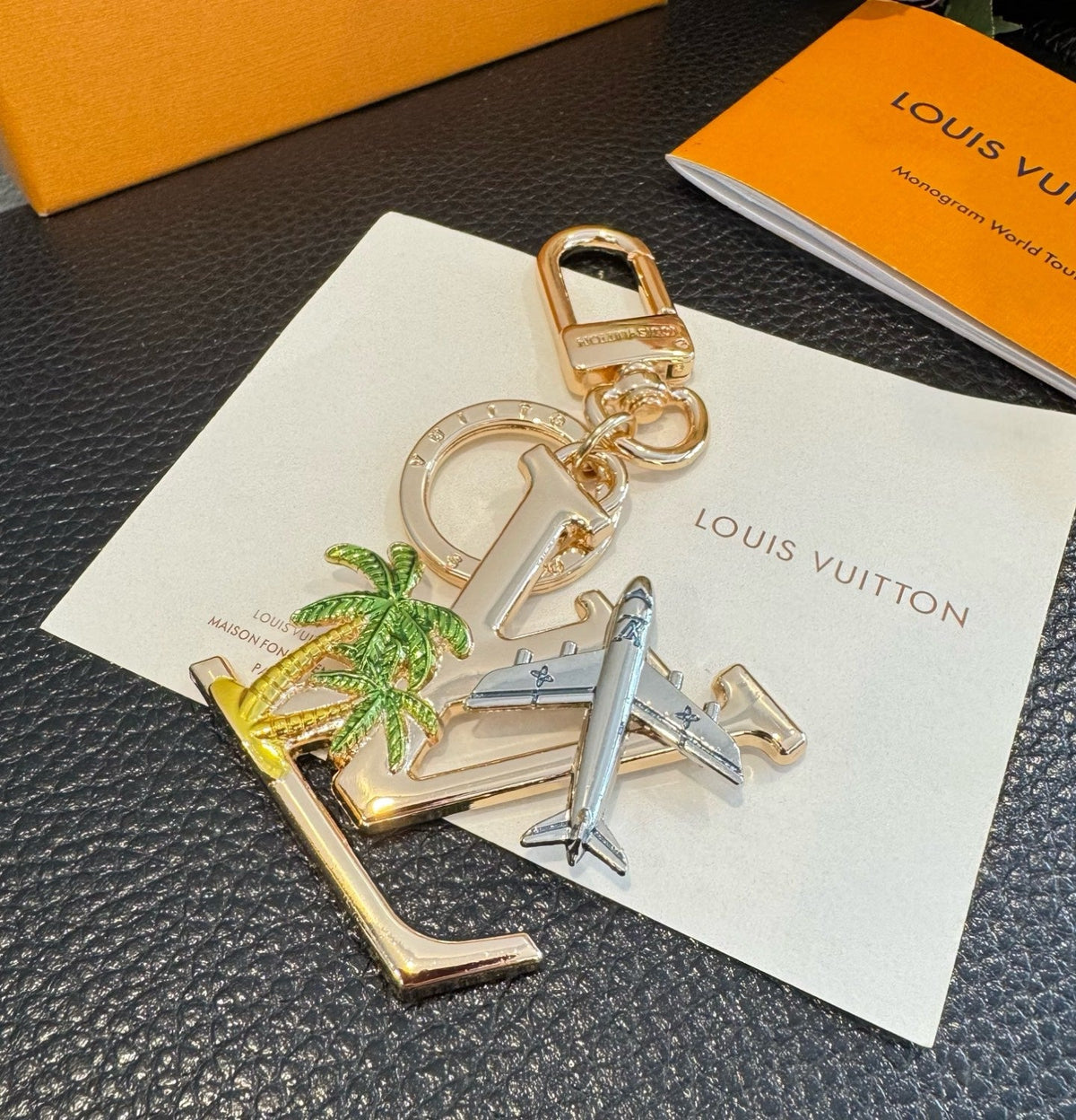 LOUIS VUITTON Metal Logo Bag Charm Keychain
