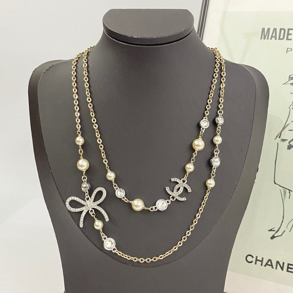 CHANEL Pearl Double-C Bow Long Necklace