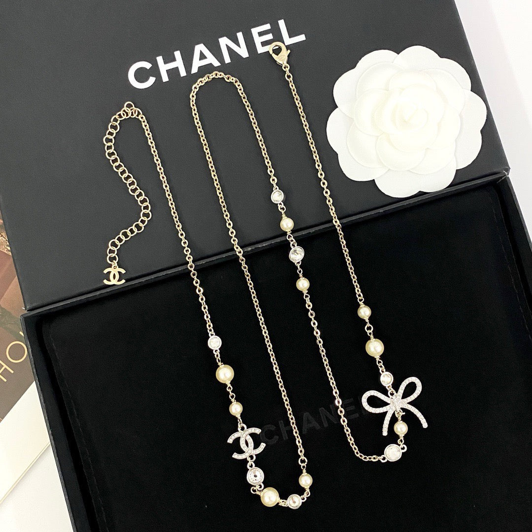 CHANEL Pearl Double-C Bow Long Necklace
