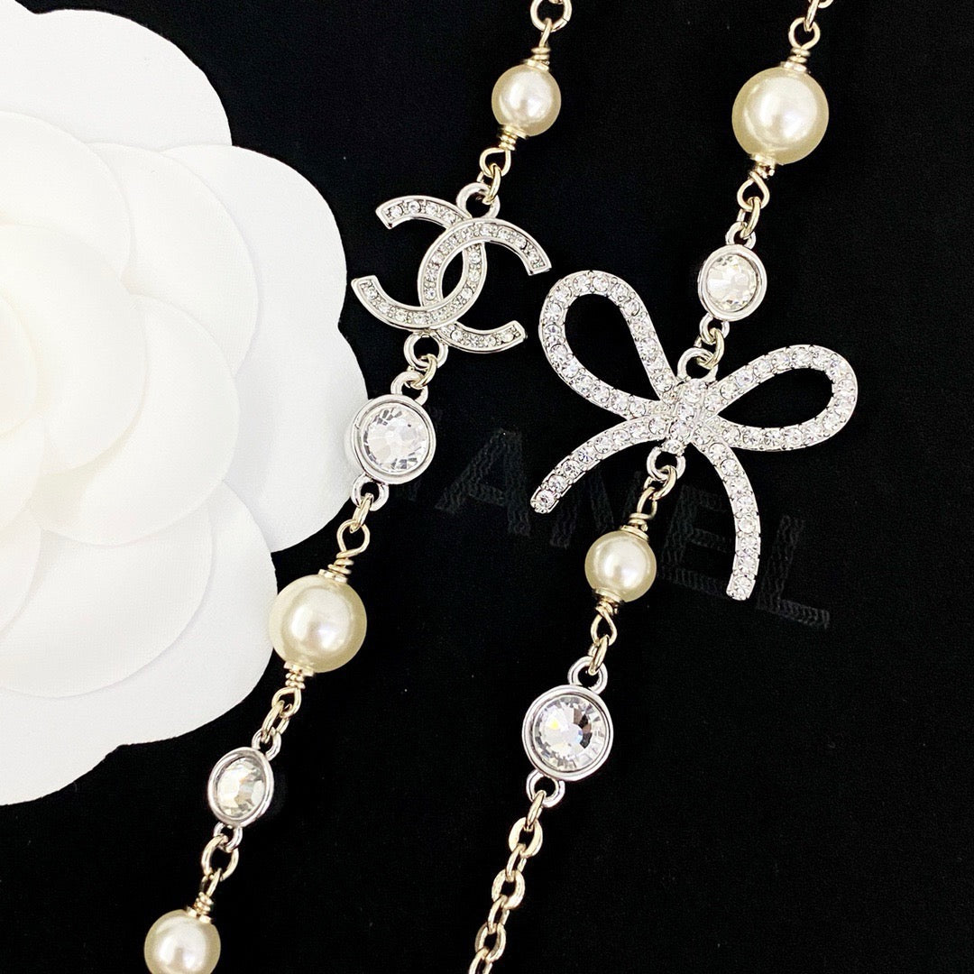 CHANEL Pearl Double-C Bow Long Necklace