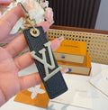 LOUIS VUITTON Leather Metal Bag Charm Keychain
