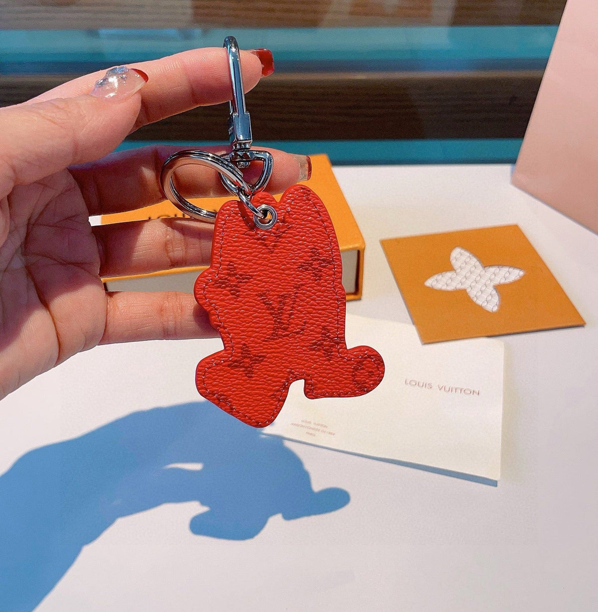 LOUIS VUITTON Metal Logo Bag Charm Keychain