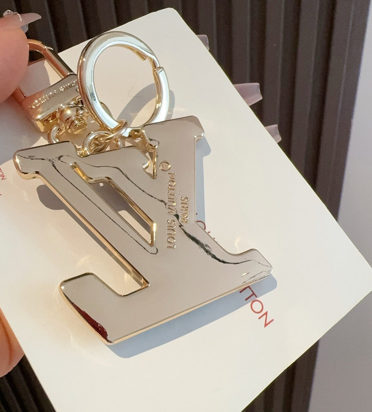 LOUIS VUITTON Metal Logo Bag Charm Keychain