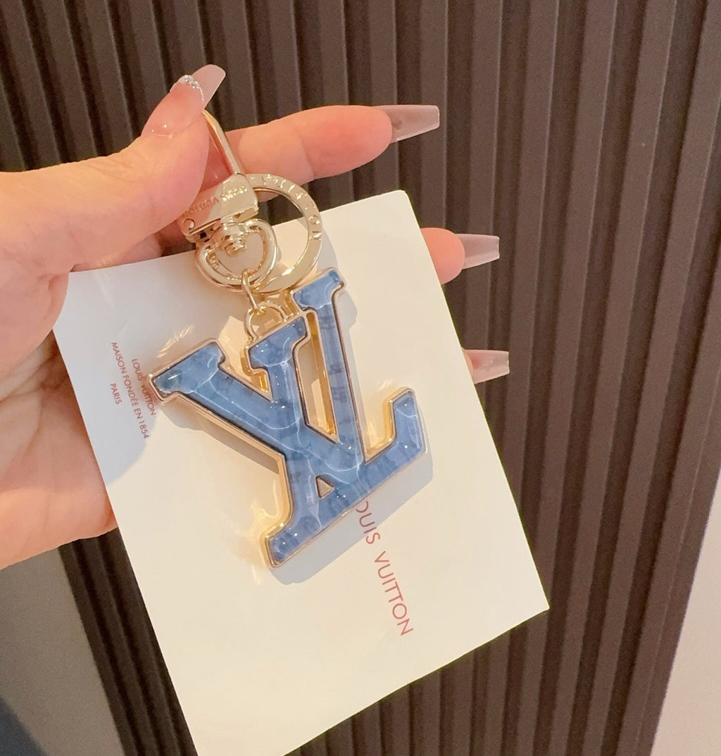 LOUIS VUITTON Metal Logo Bag Charm Keychain