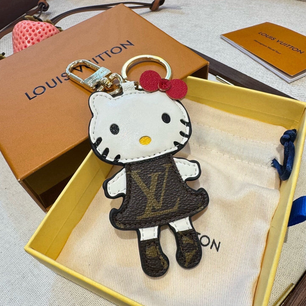 LOUIS VUITTON Metal Logo Bag Charm Keychain