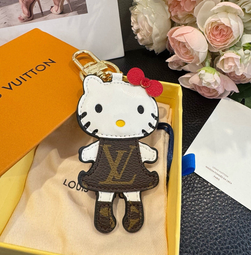 LOUIS VUITTON Metal Logo Bag Charm Keychain