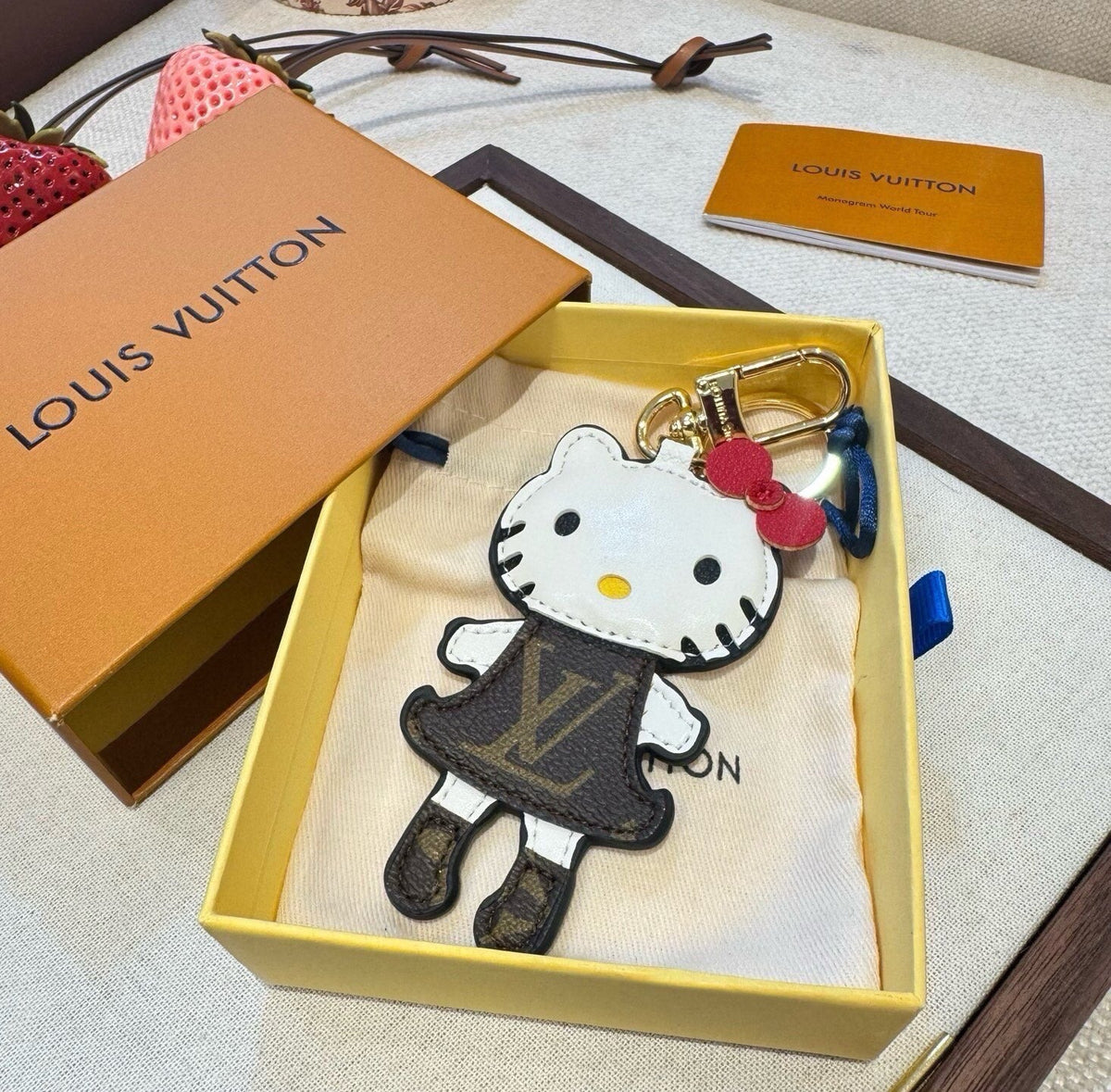 LOUIS VUITTON Metal Logo Bag Charm Keychain