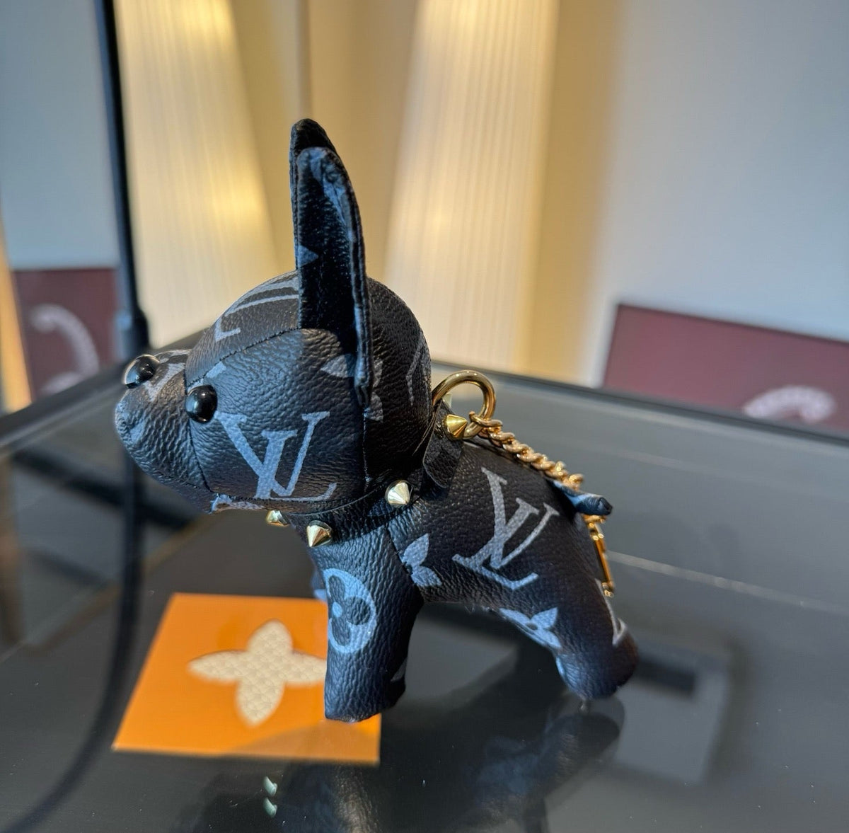 LOUIS VUITTON Metal Logo Keychain