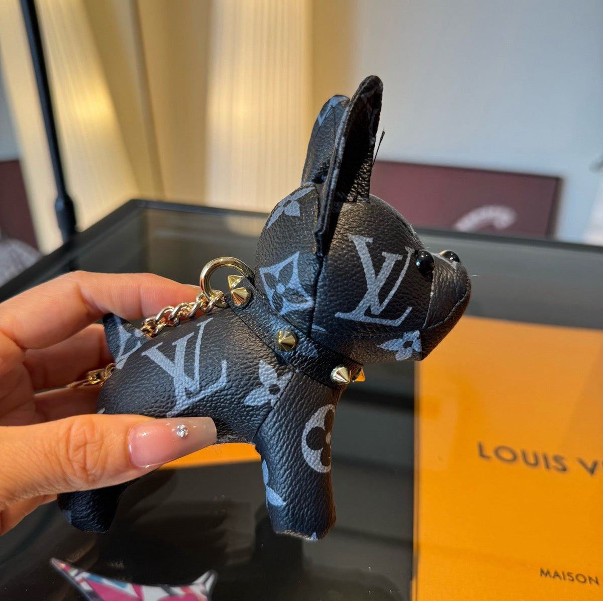 LOUIS VUITTON Metal Logo Keychain
