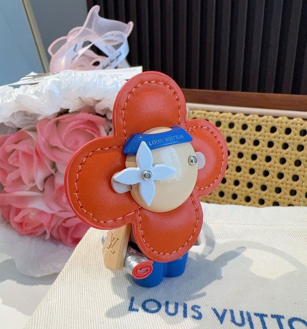 LOUIS VUITTON Metal Logo Bag Charm Keychain