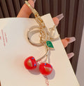 LOUIS VUITTON Metal Logo Bag Charm Keychain