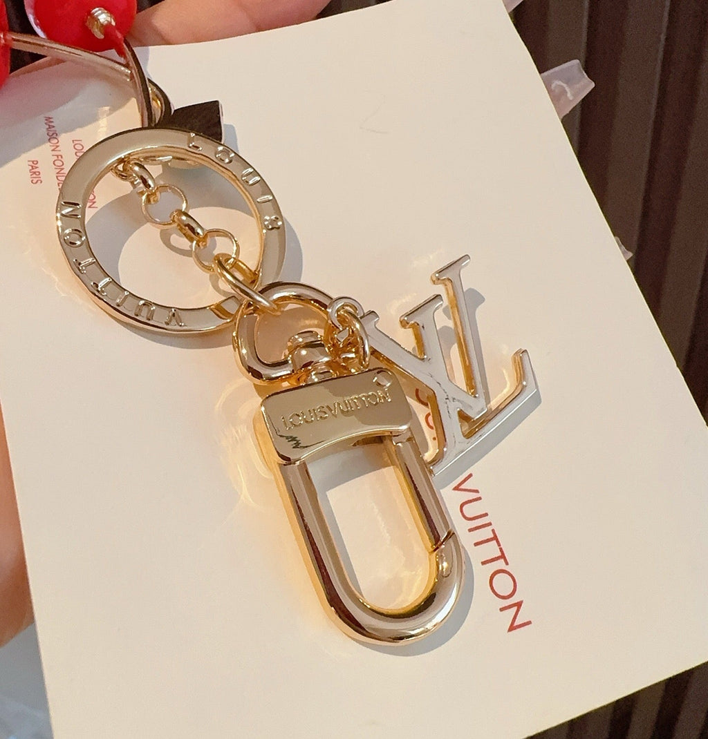LOUIS VUITTON Metal Logo Bag Charm Keychain