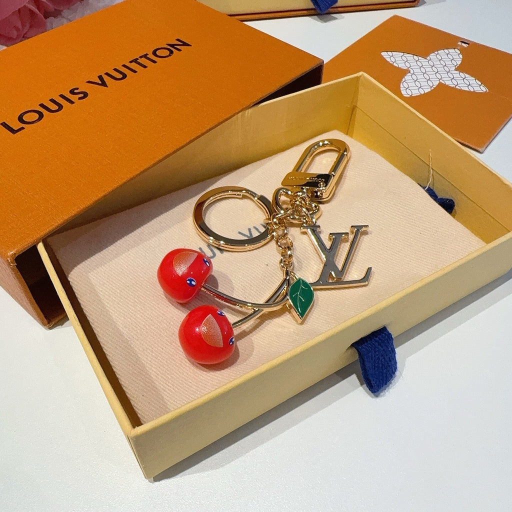 LOUIS VUITTON Metal Logo Bag Charm Keychain