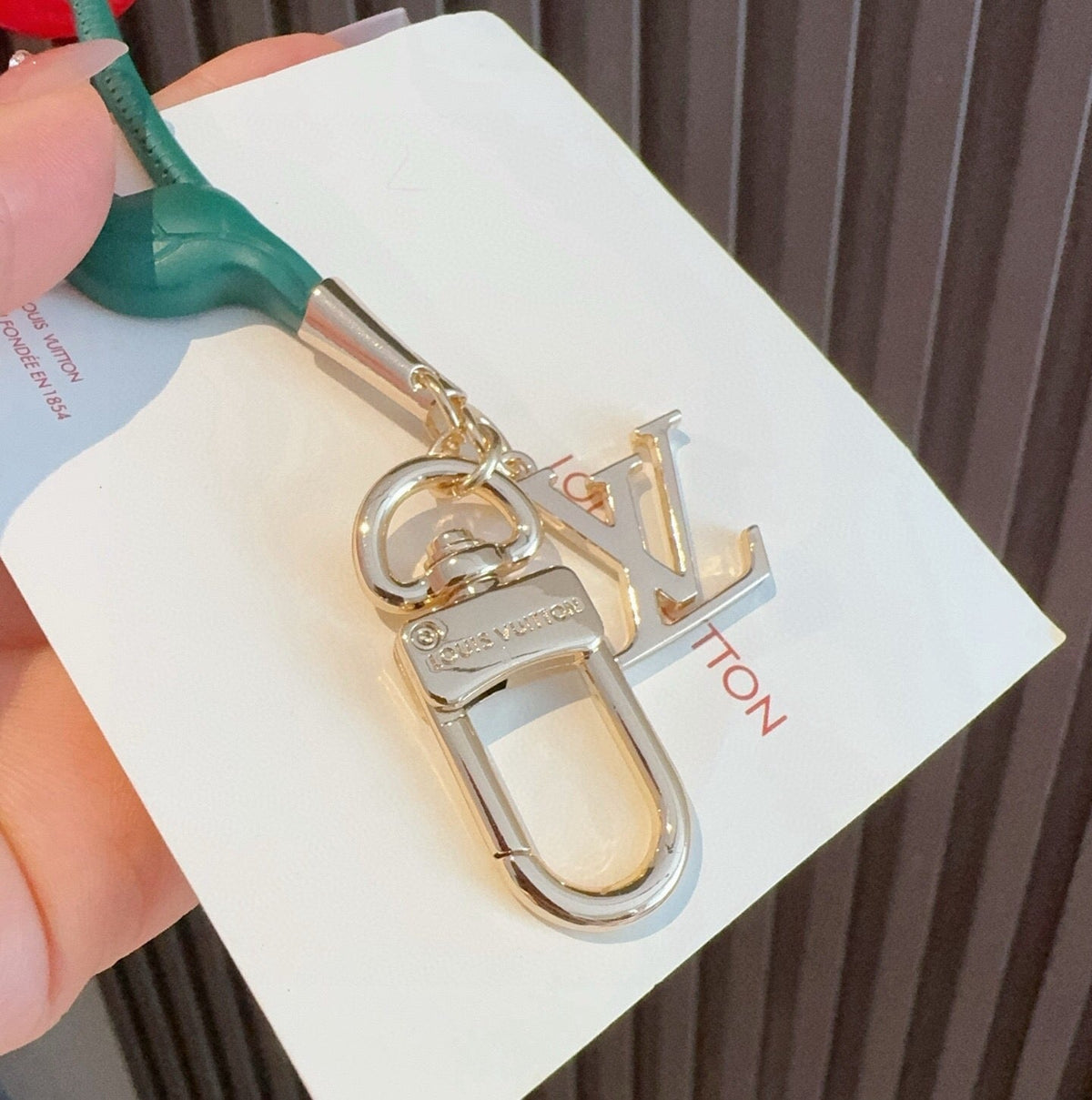 LOUIS VUITTON M02476 Metal Logo Bag Charm Keychain