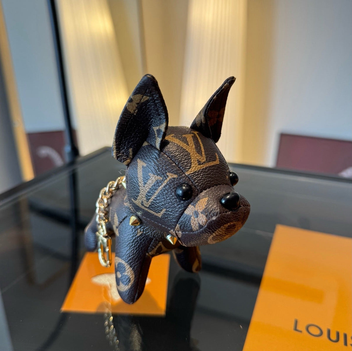 LOUIS VUITTON Metal Logo Keychain