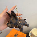 LOUIS VUITTON Metal Logo Keychain