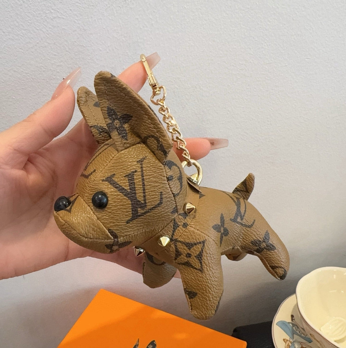 LOUIS VUITTON Metal Logo Keychain