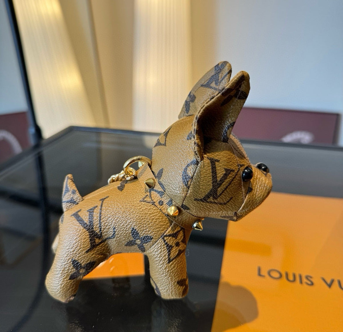 LOUIS VUITTON Metal Logo Keychain
