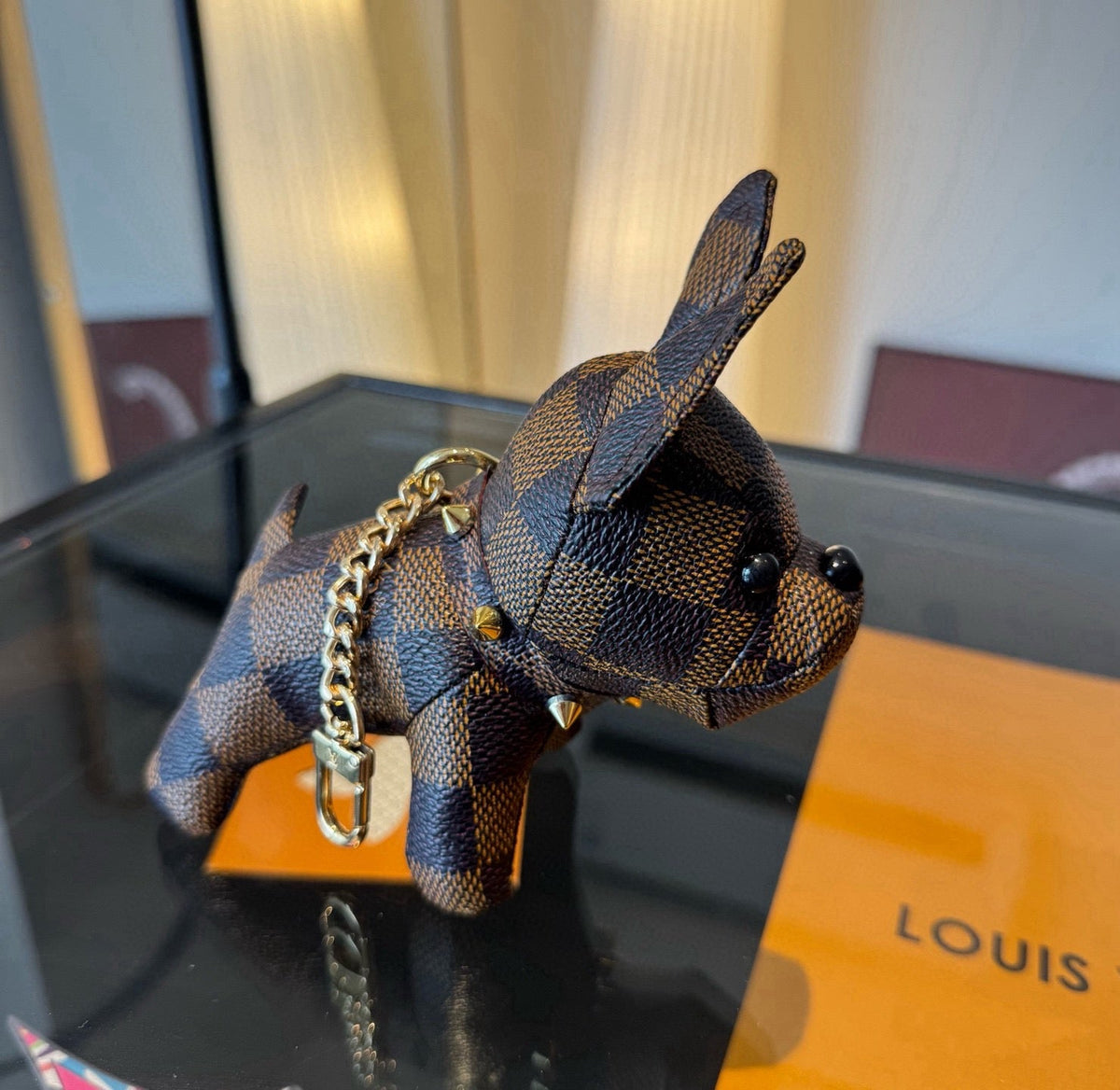 LOUIS VUITTON Metal Logo Keychain