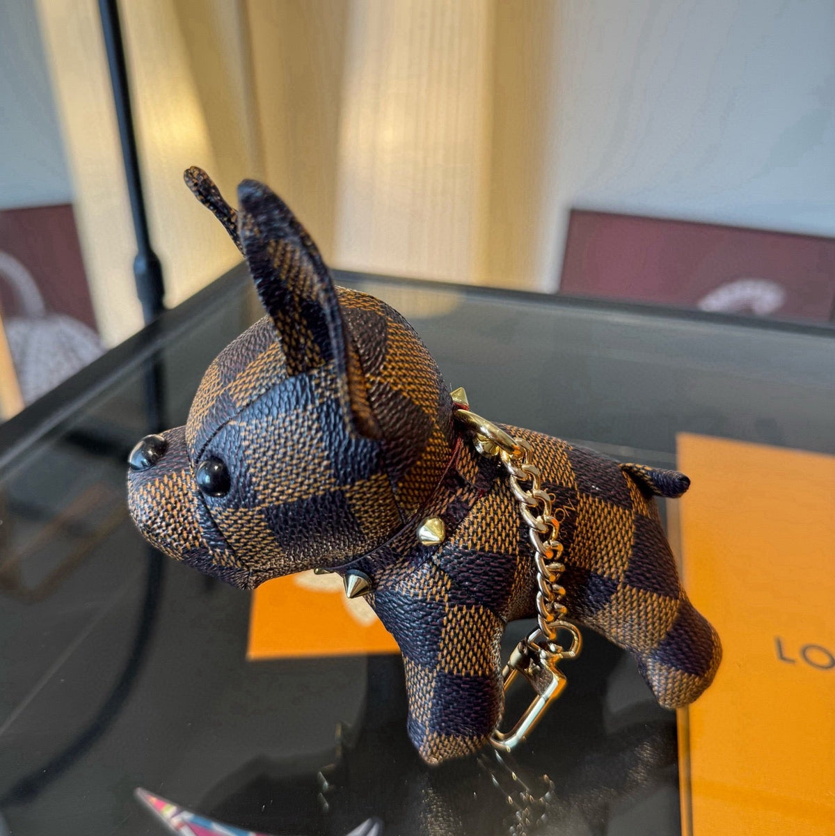 LOUIS VUITTON Metal Logo Keychain