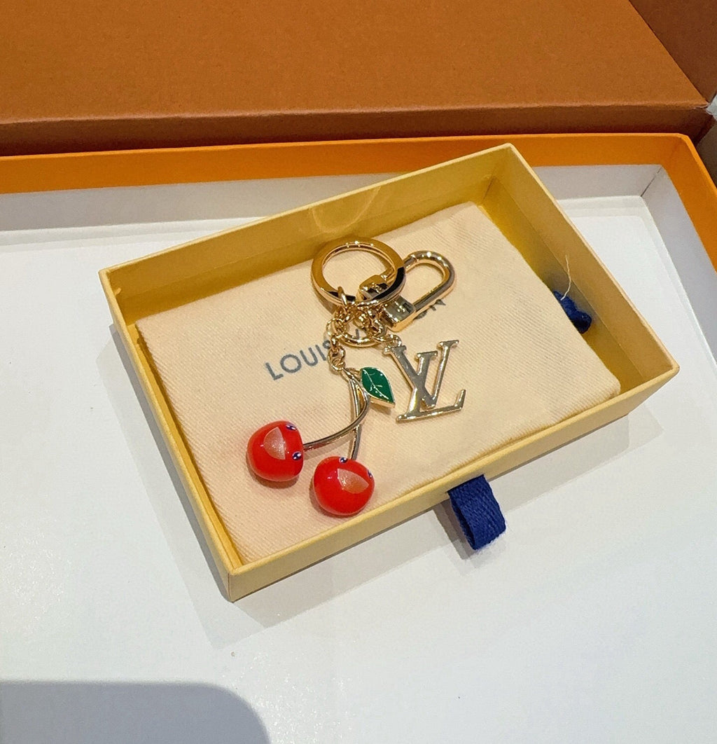 LOUIS VUITTON Metal Logo Bag Charm Keychain