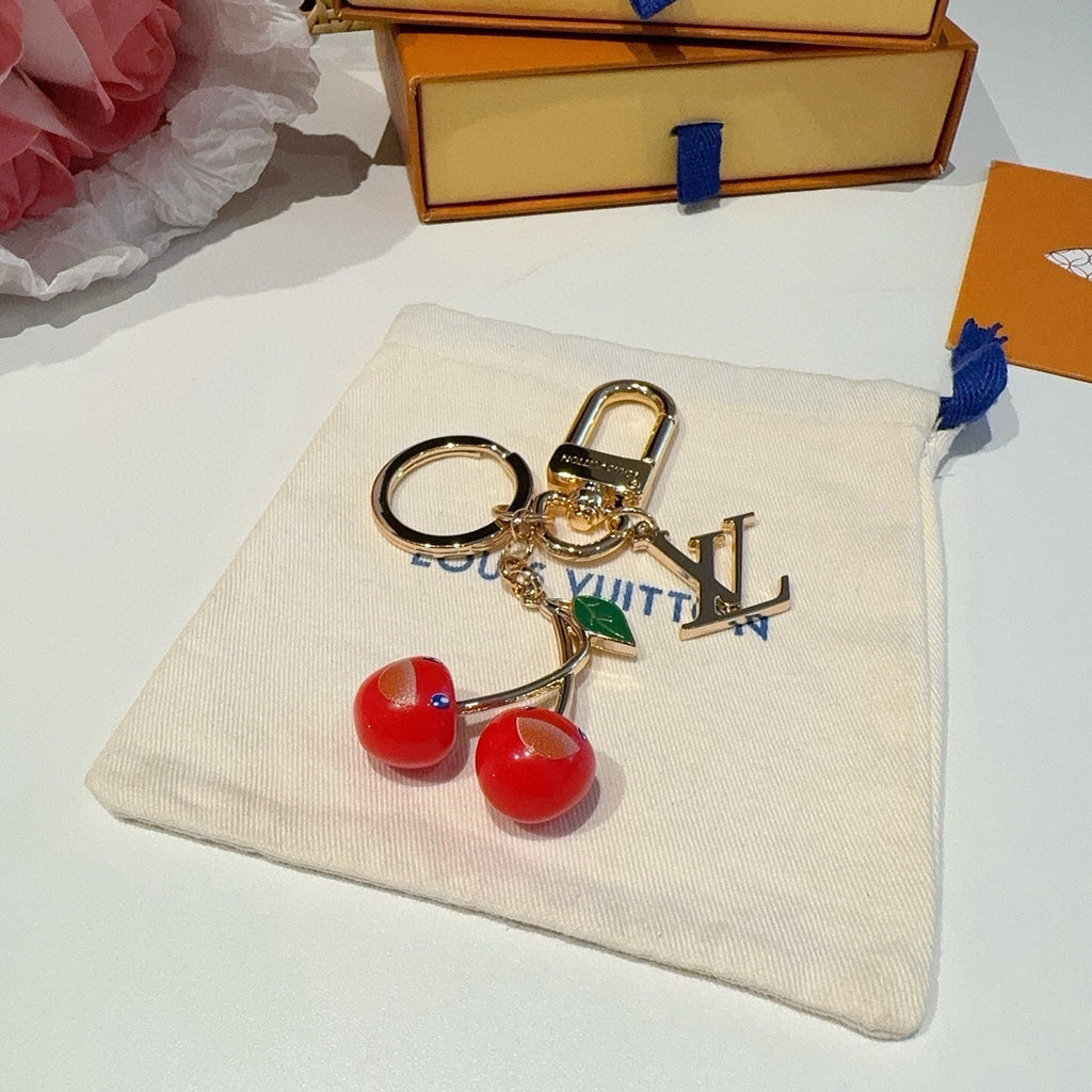 LOUIS VUITTON Metal Logo Bag Charm Keychain