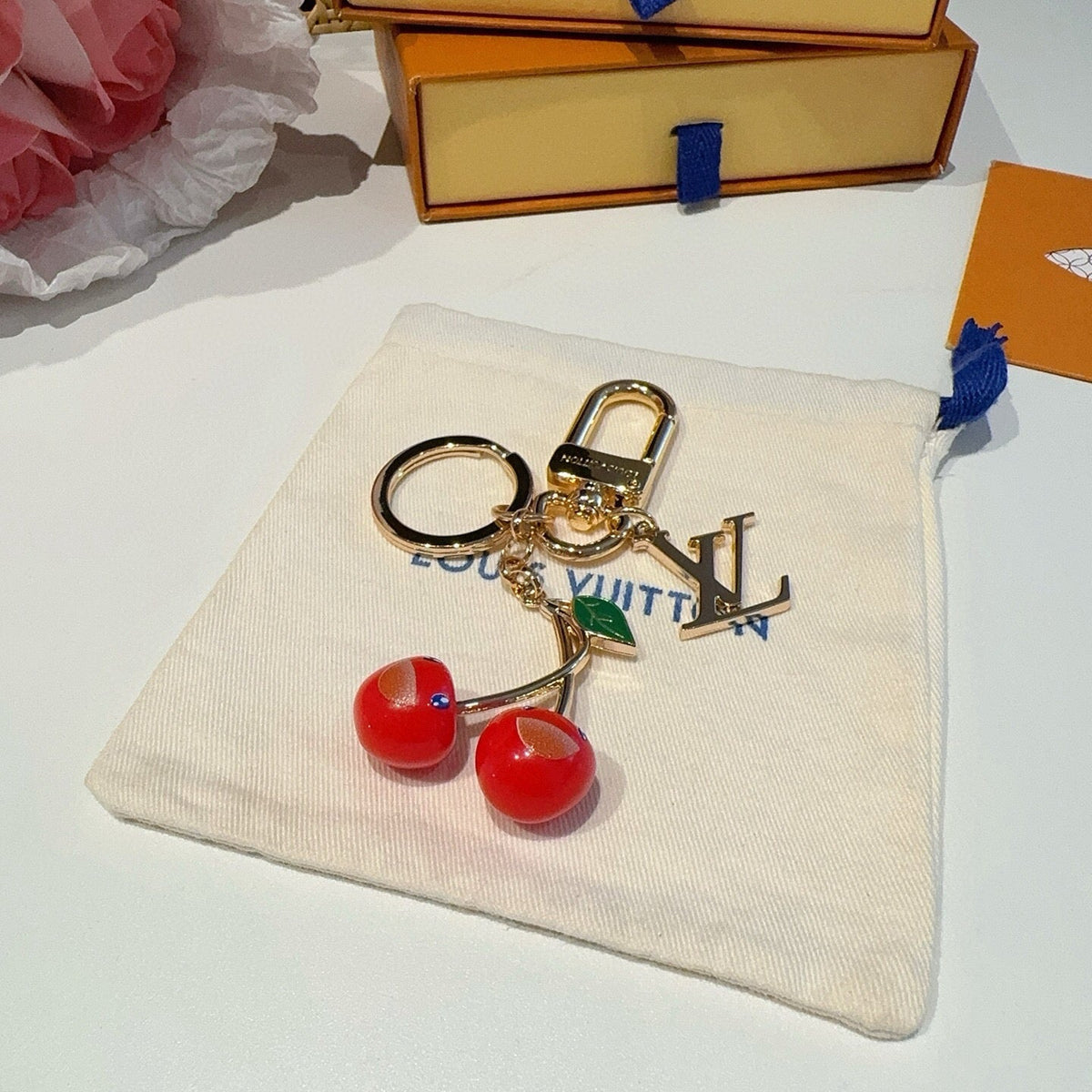 LOUIS VUITTON Metal Logo Bag Charm Keychain