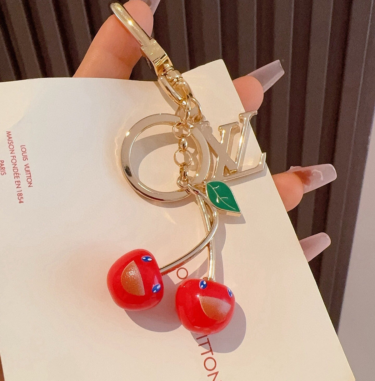LOUIS VUITTON Metal Logo Bag Charm Keychain